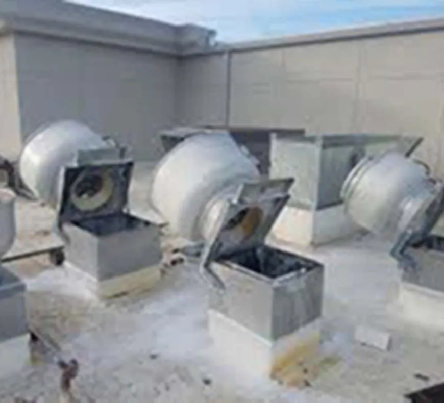 Exhaust fan hinge kit installation on Las Vegas commercial kitchen roof